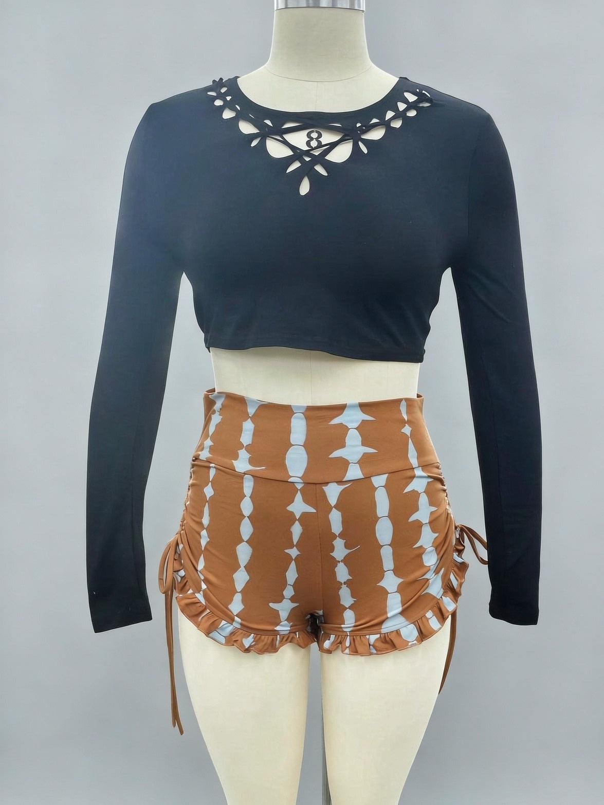 High-Waist Booty-Shorts aus Baumwollmischung im Festival-Stil